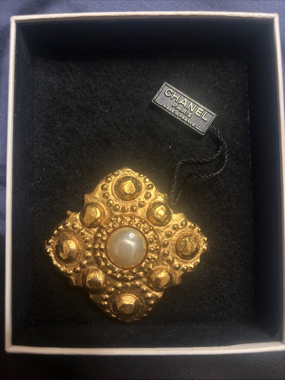 CHANEL Gold-Tone Ornate Brooch with Central Pearl